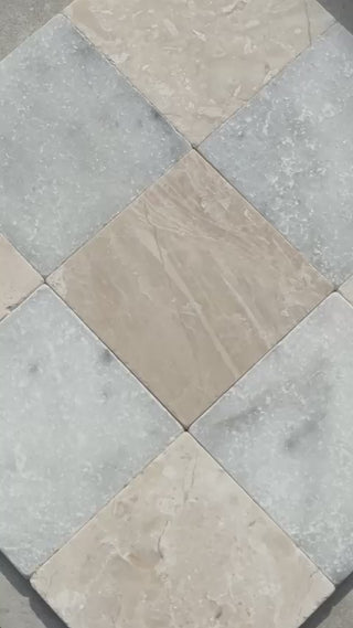 White and Beige Tumbled Marble Chequer Tiles Laid out in a grid